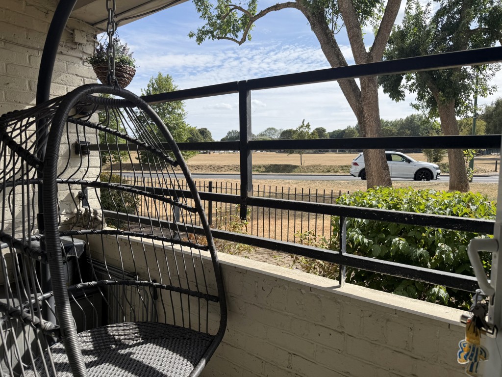 Lot: 206 - GROUND FLOOR FLAT WITH LONG LEASE - Balcony area with view overlooking green